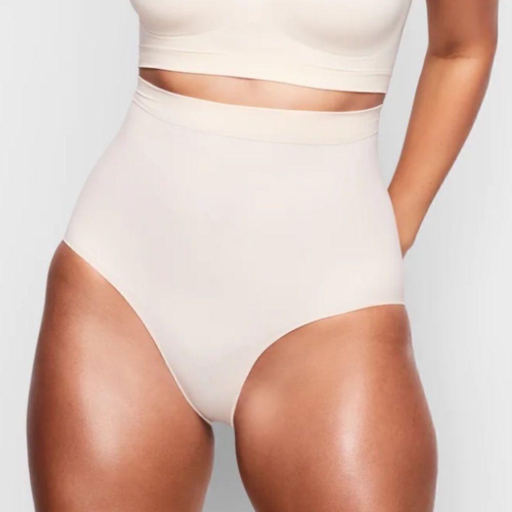 SKIMS Seamless Sculpt Mid Waist Core Control Brief Shape Wear In Sand Nude